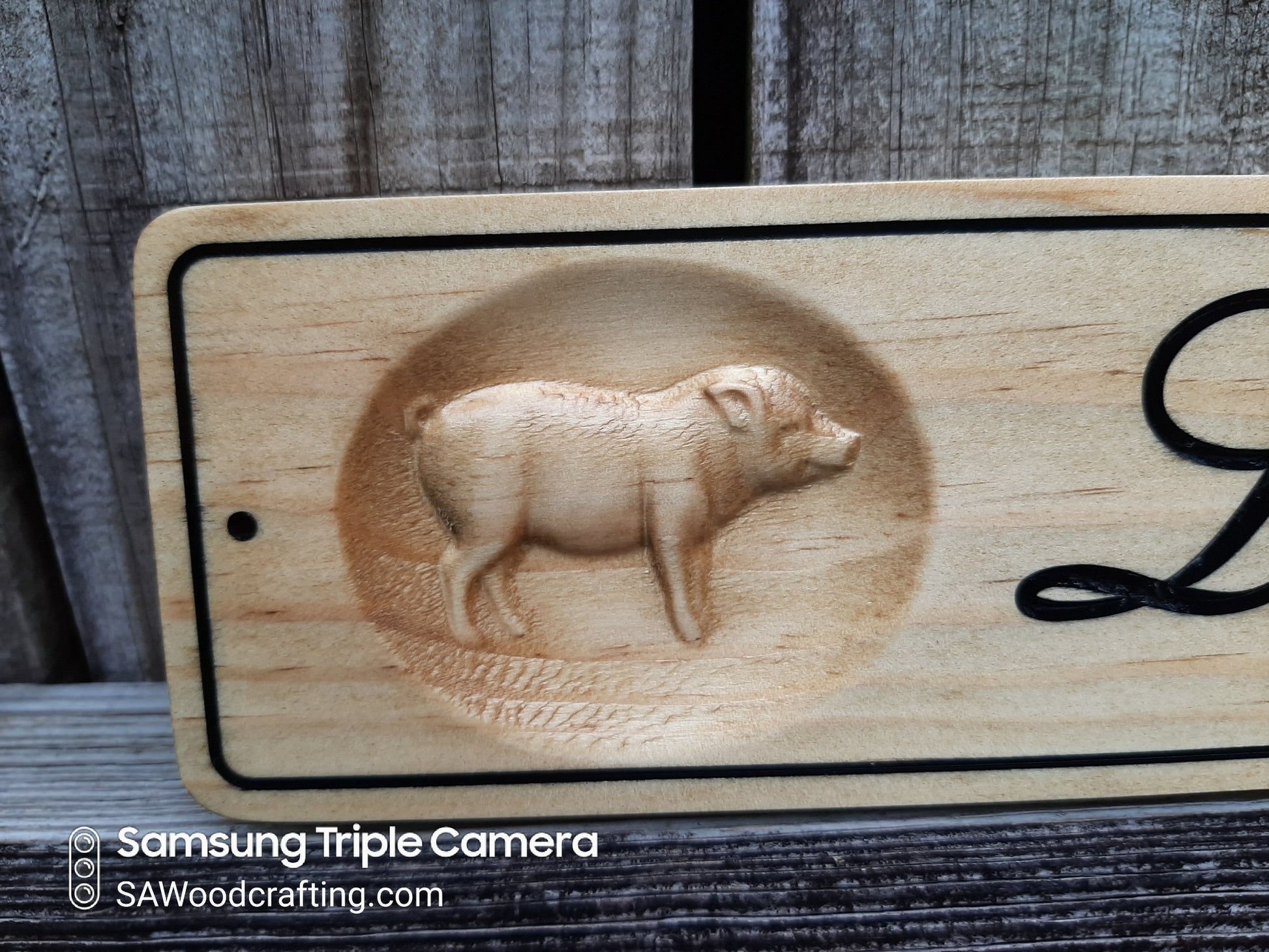 Wood carved sign for Pig Pen made in the USA.