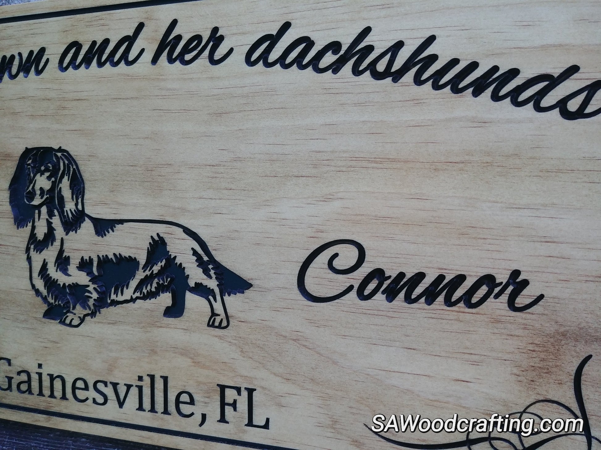 Dog owner name sign with Dachshunds made in the USA.