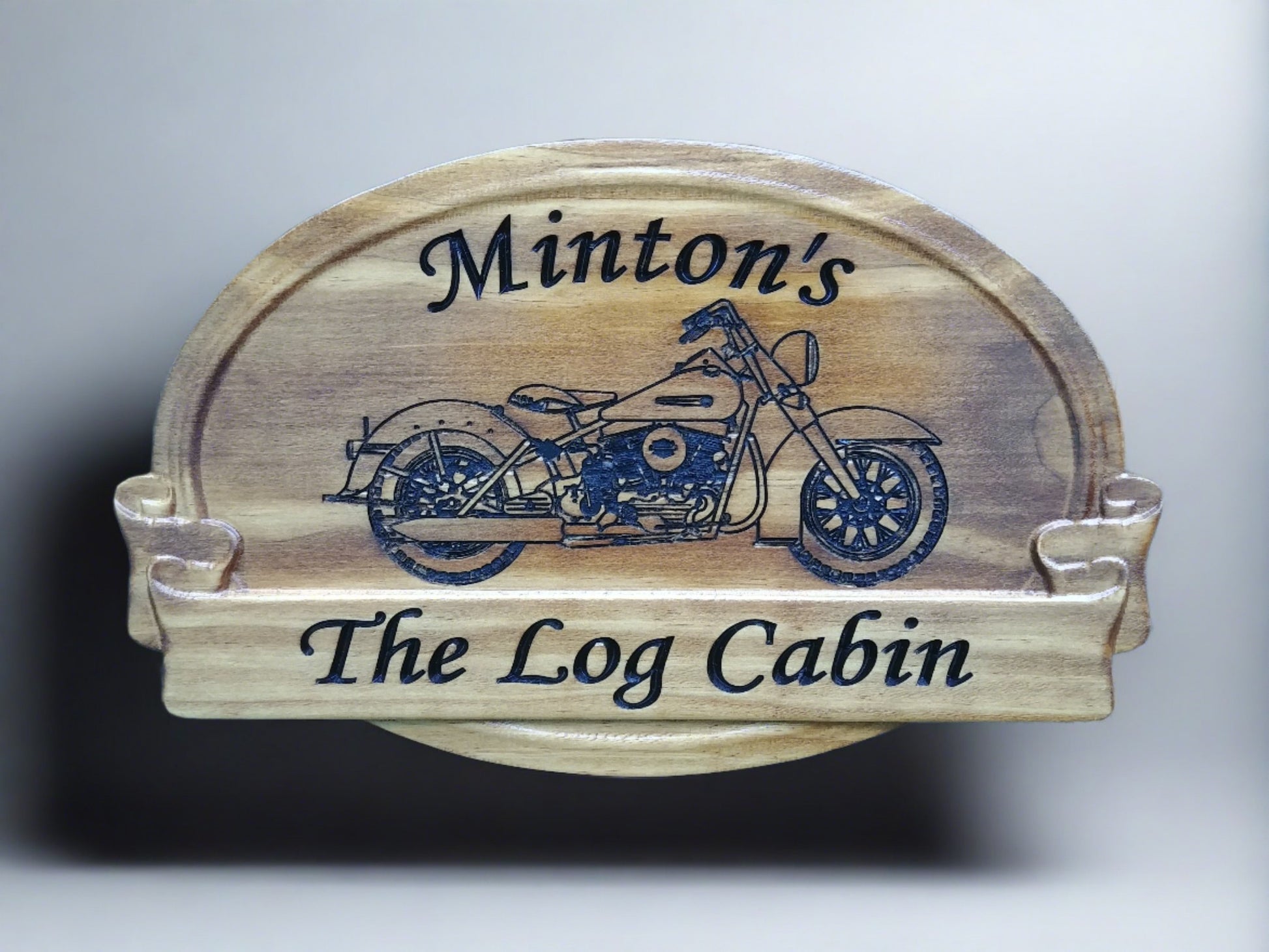 Purchase this beautiful solid Pine Family Name sign featuring v-carved Harley motorcycle graphic and personalized text, finished in Early American stain. Rustic heirloom. Made in America.