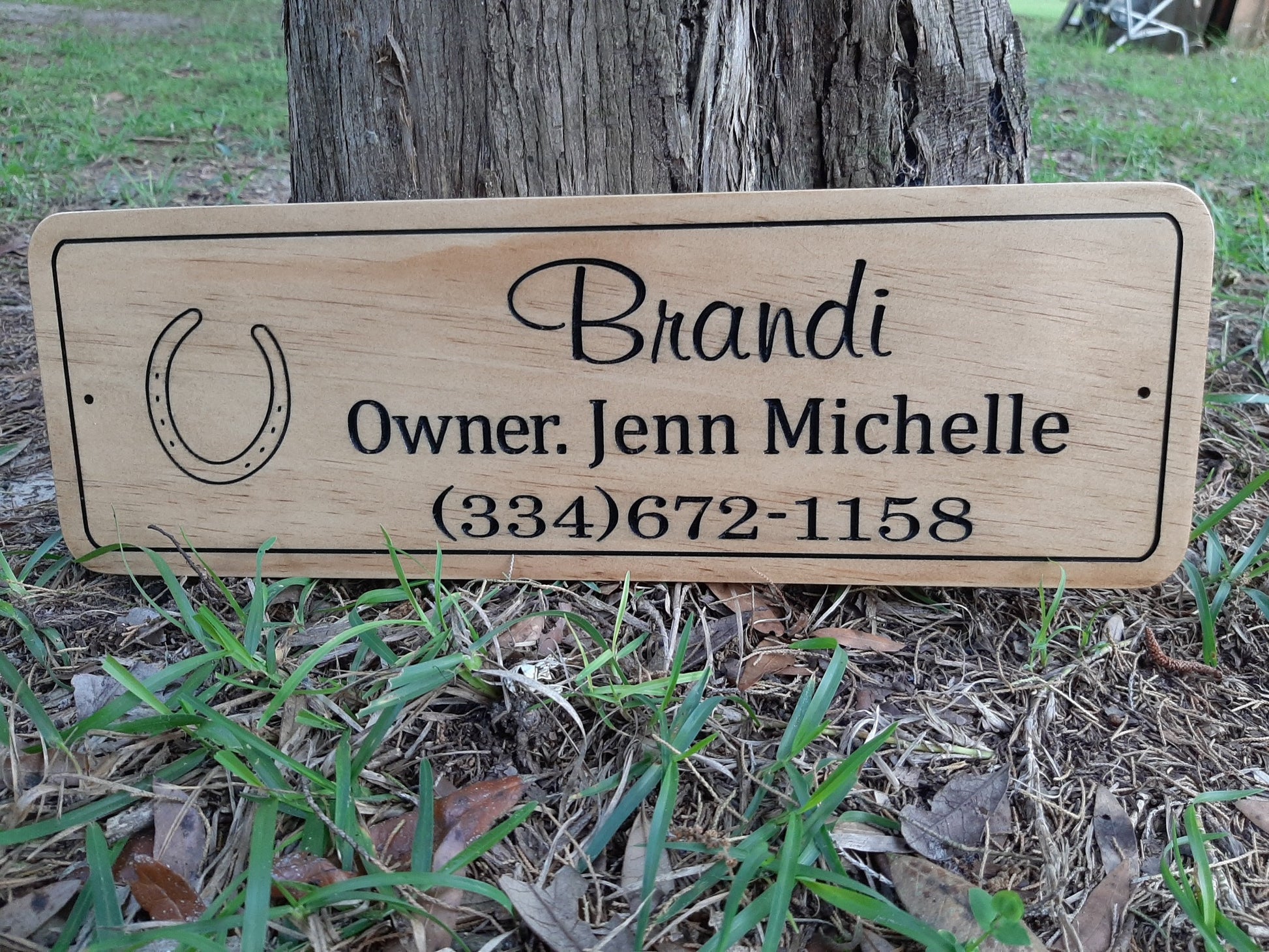Horse stall name plate with owners name and phone number